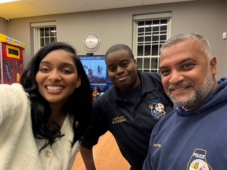 Yvonne Harper with Baltimore County police officers at a community event