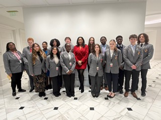 Yvonne Harper with a group of student leaders